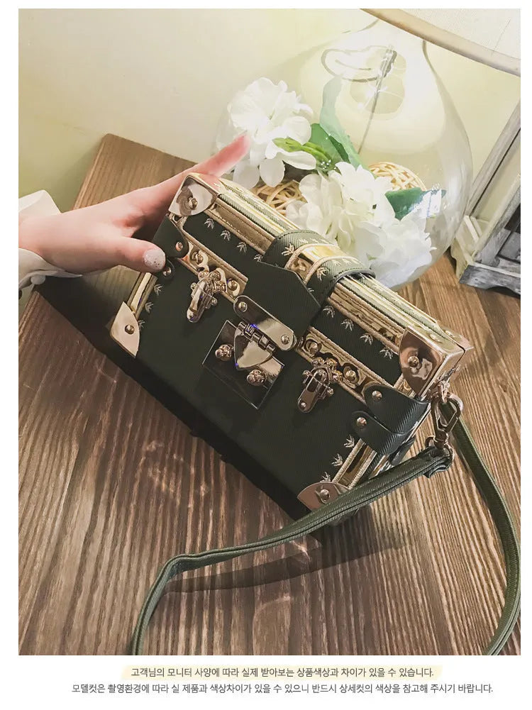 Hard structured PU leather women's shoulder bag with rivet decoration and hasp closure flap