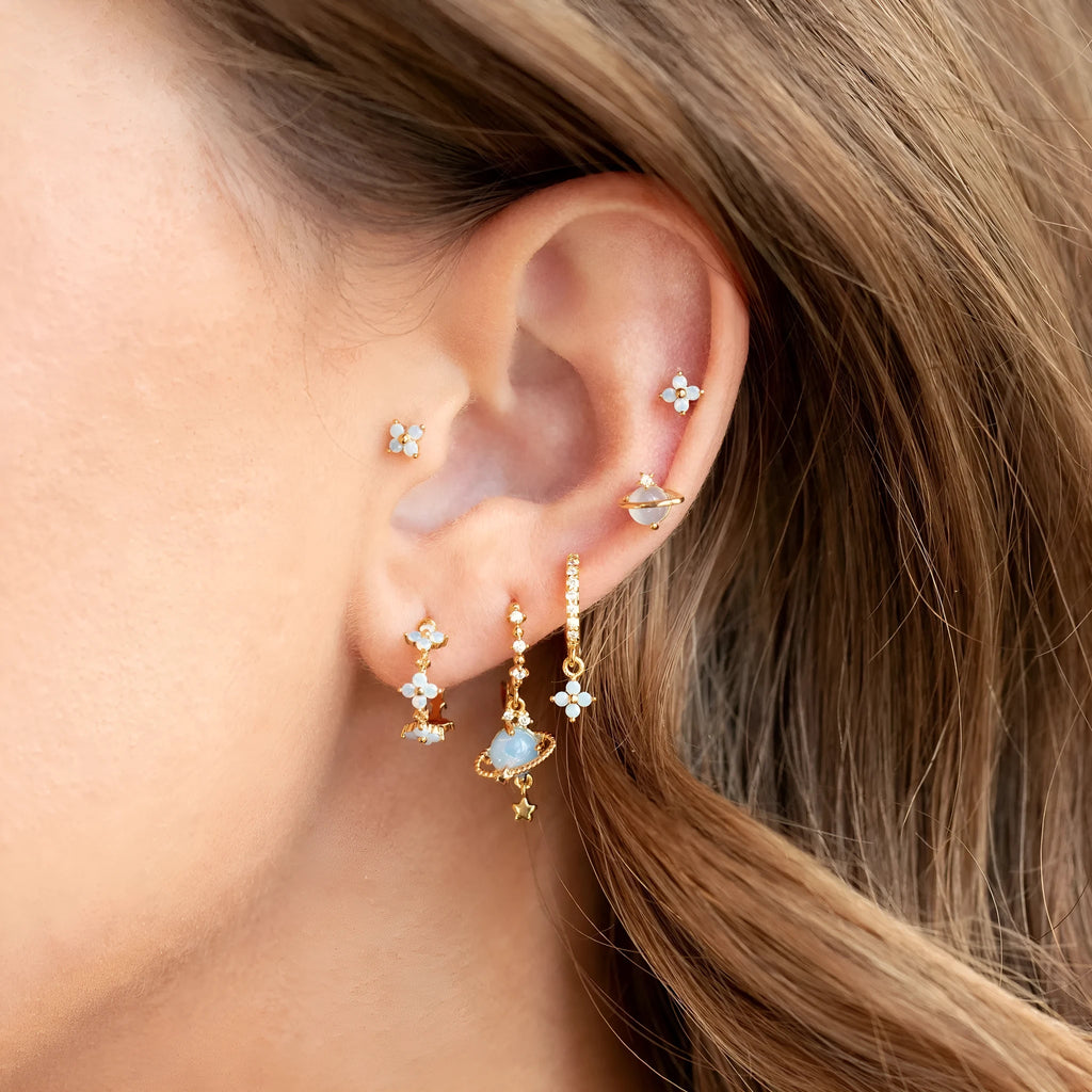 Gold and silver Japanese Korean style flower ear studs with zircon mosaic detail.