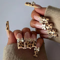 Leopard print butterfly nail art pieces for artificial nail decoration in WM296 colour