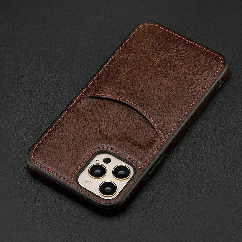 Dark blue PU leather protective case for iPhone mobile phones on a table.
