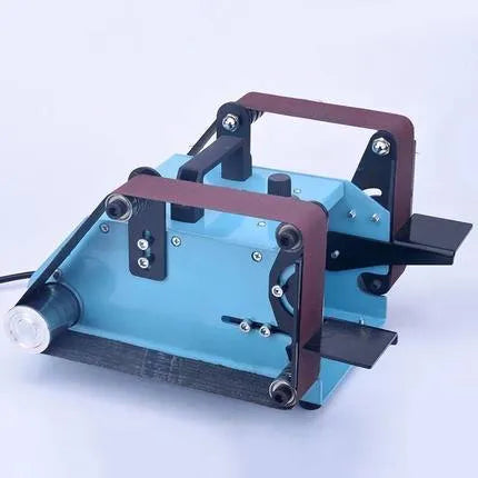 Blue desktop dual-axis belt sander with a 750W motor and variable speed switch for sharpening and polishing.