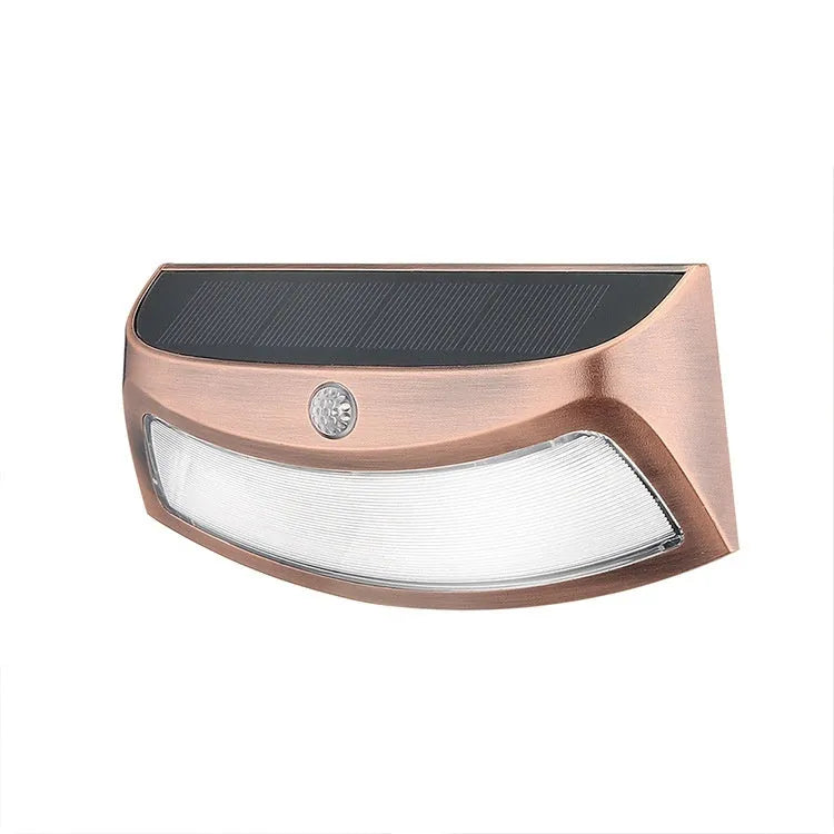 Solar-powered outdoor wall lamp with smiling face design in ABS plastic.