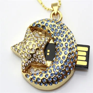 Creative metal jewellery-shaped USB flash drive on a keyring against a plain background.
