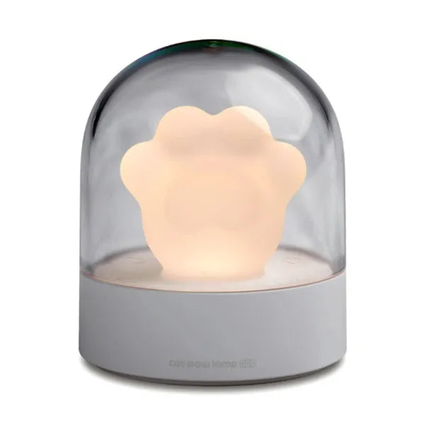 Grey and pink cat paw shaped night light with USB charging port and music box functions