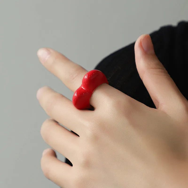Heart-shaped ring with raised three-dimensional enamel detailing in a choice of colours