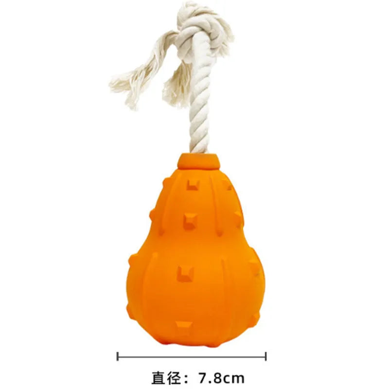 Natural rubber stuffable dog toy with a long strap for fetch and interactive chewing games.