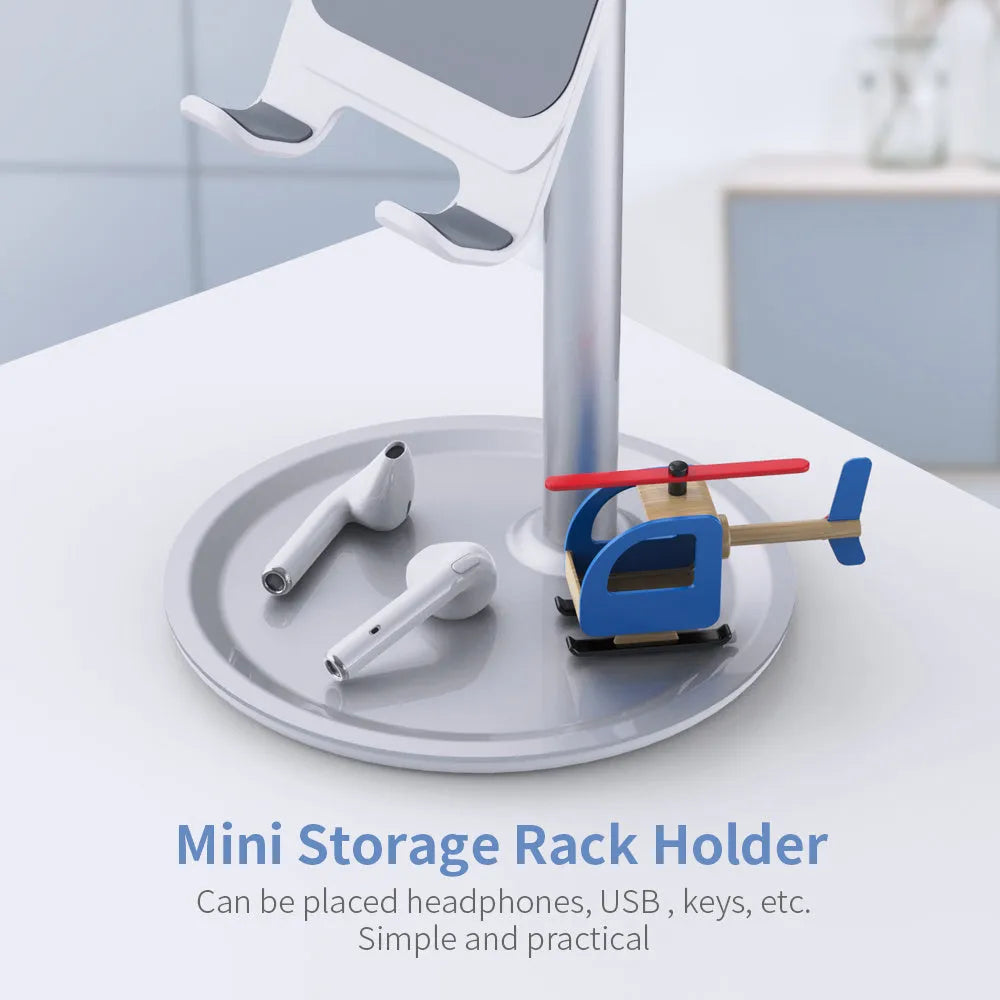 Silver white aluminium alloy mobile phone desktop stand holding a smartphone at an adjustable angle