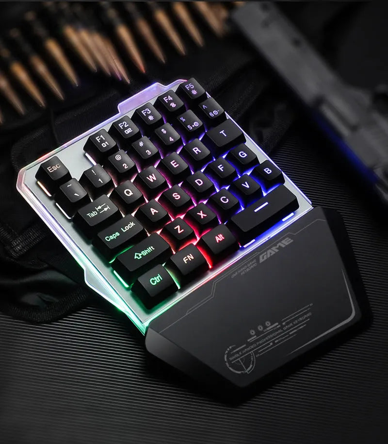 G40 black one-handed mechanical gaming keyboard with RGB backlit keys and a USB cable.