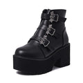 Black women's punk gothic ankle boots with bat buckle, side zipper, and chunky platform heel.
