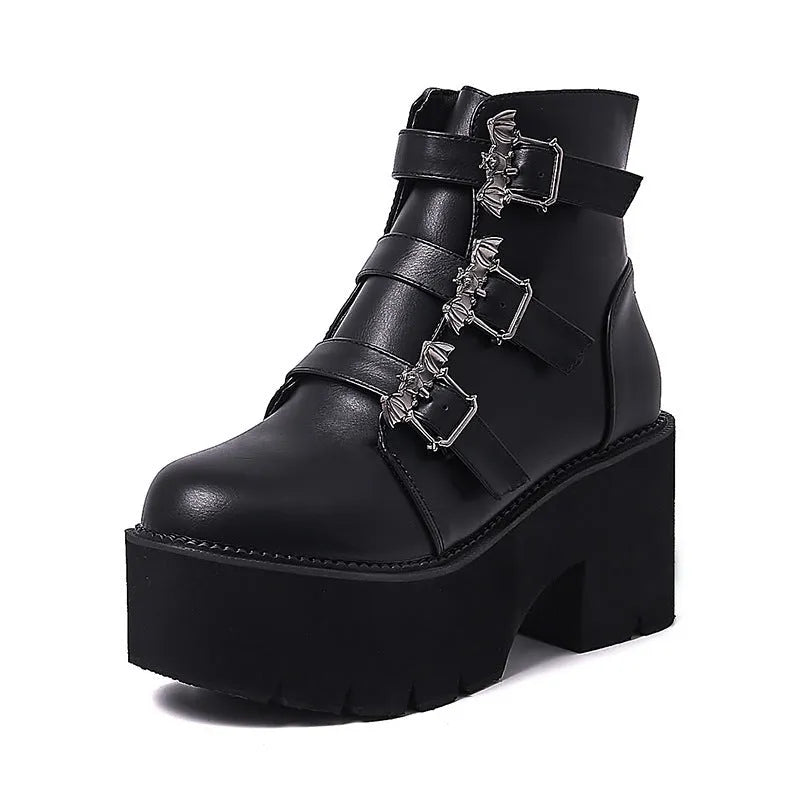 Black women's punk gothic ankle boots with bat buckle, side zipper, and chunky platform heel.