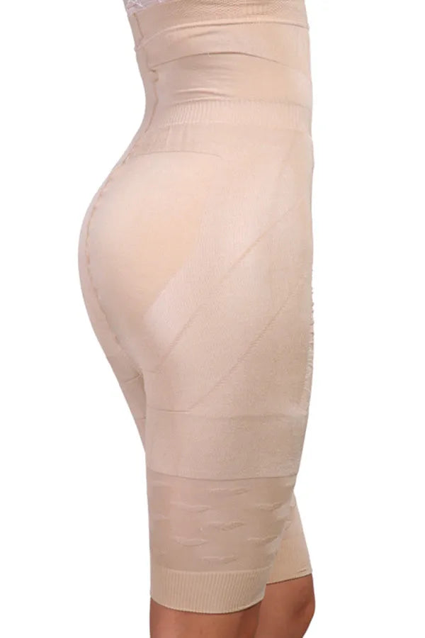 Women's black seamless high-waist shapewear shorts laid flat showing tummy control panel.