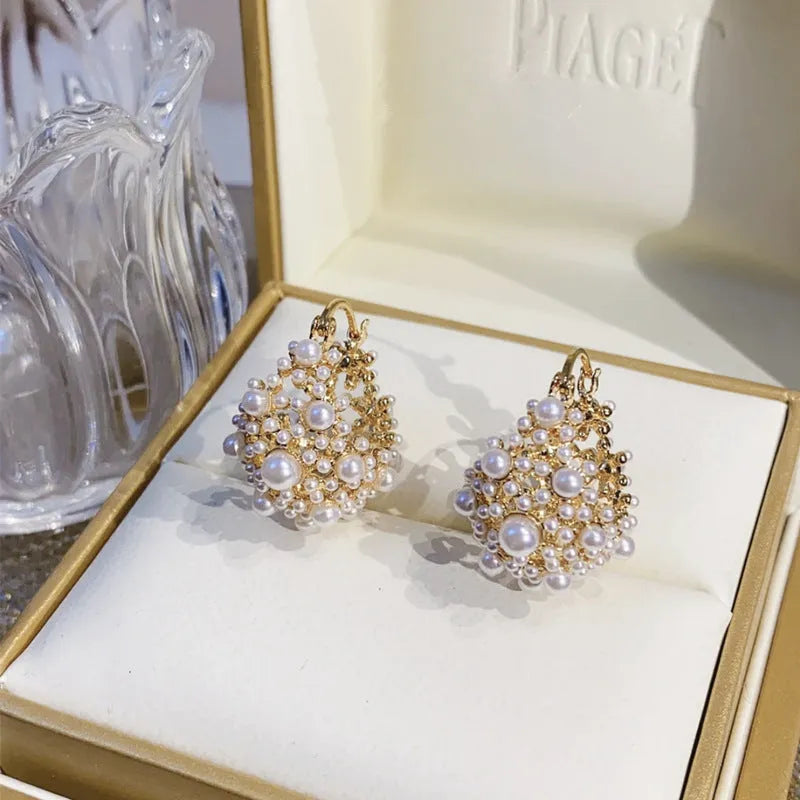 Gold copper flower basket earrings with pearl inlay and small rice-shaped beads