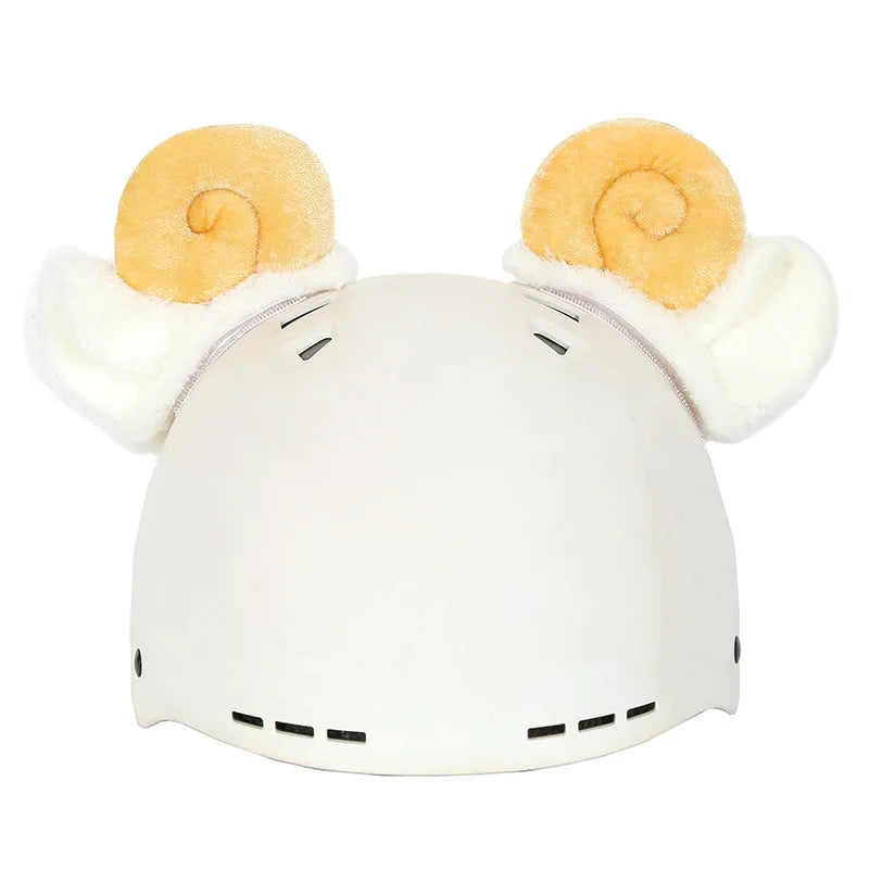 Plush cartoon-themed cover set on a medium motorcycle helmet with soft ear decorations.