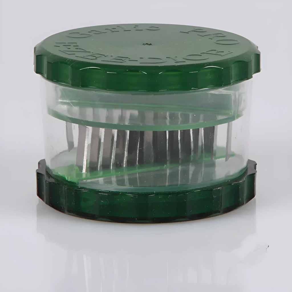 Green transparent polypropylene garlic peeler on a kitchen counter