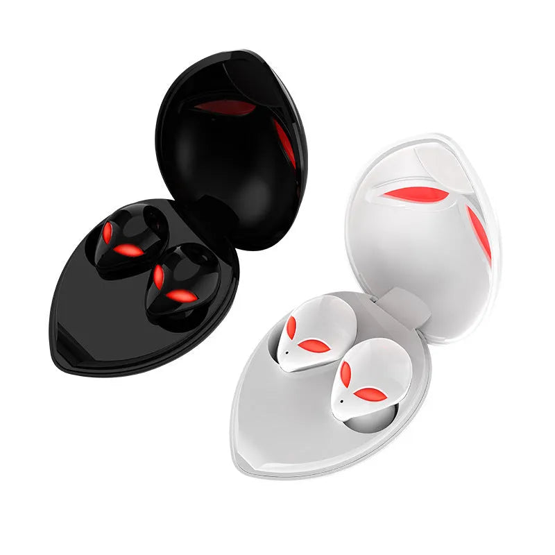 Creative Outer T8 Starman alien-design Bluetooth headset with red and blue lights in charging case.