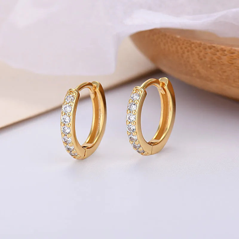 Gang Drill Zircon stud earrings in silver with geometric starry sky design, unisex style