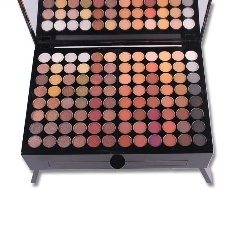 Piano-shaped makeup palette open to show 190 eyeshadow, blush, powder and contour pans