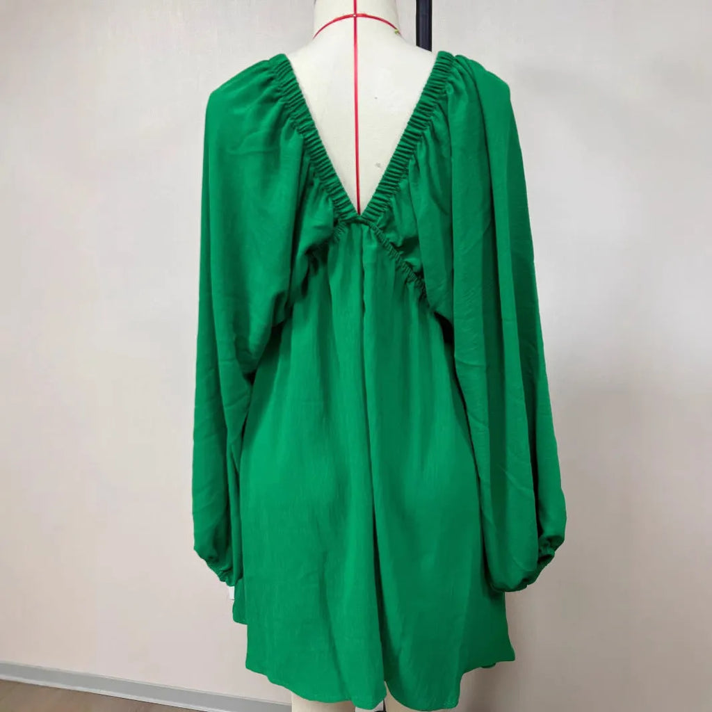 Women's polyester puff sleeve dress with V-neck and flounced swing skirt in apricot colour