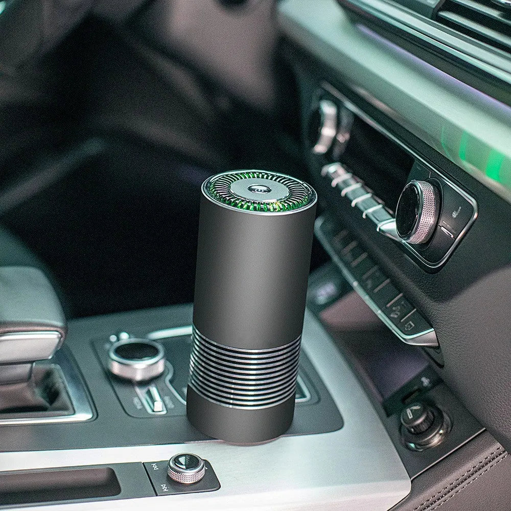 Compact aluminium alloy car wireless air purifier in black, silver, or metallic grey measuring 65mm by 150mm