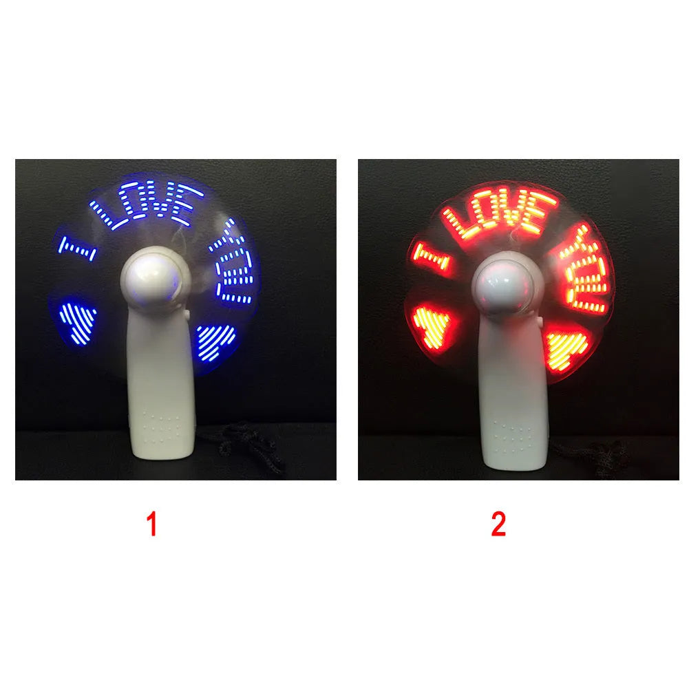 White handheld mini fan with a blue and red LED 'I love you' display lit up.