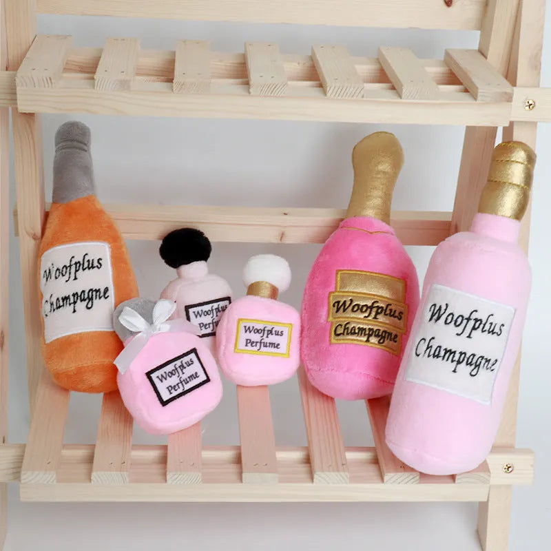 Plush wine bottle shaped dog toy with squeaker in multiple colour variations