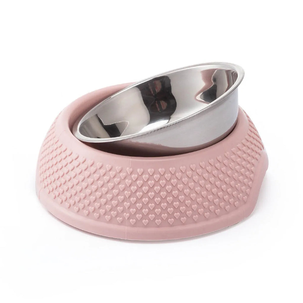 Blue stainless steel pet bowl with a non-slip weighted base on a floor.