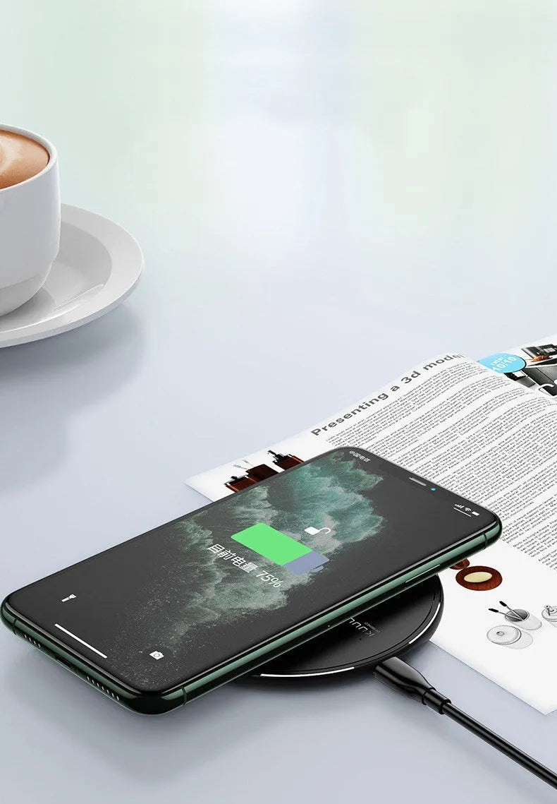 Black Kuulaa wireless disc phone charger with Micro USB cable