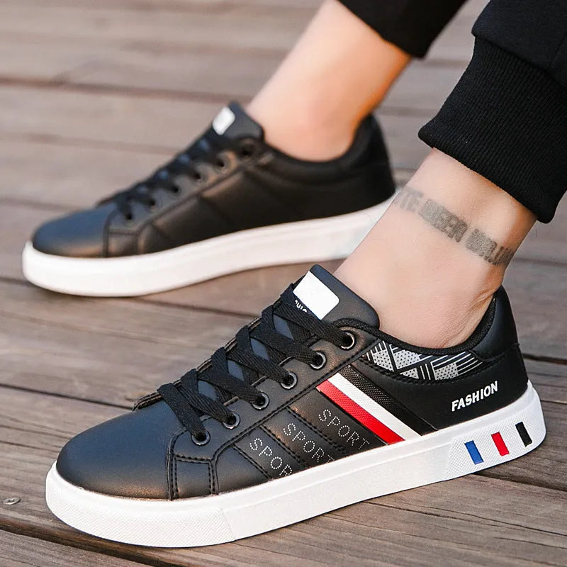 Pair of sports shoes in black colour with mesh upper, EVA midsole, and patterned rubber outsole.