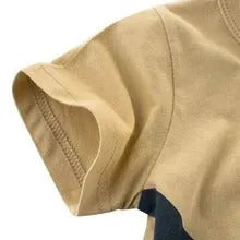 Children's green lion print cotton T-shirt on a hanger, showing crew neck and short sleeves.