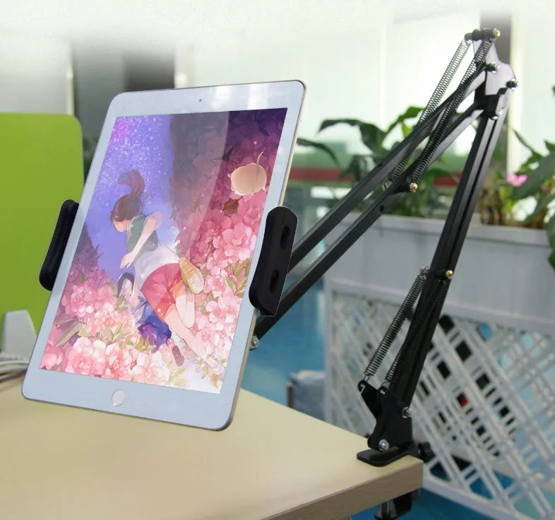 Adjustable phone and tablet stand in black and white colours on desktop