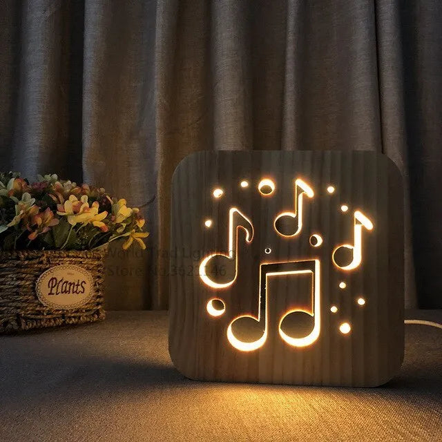 Pine wood cube LED atmosphere lamp with warm white glow, shown with USB cable.
