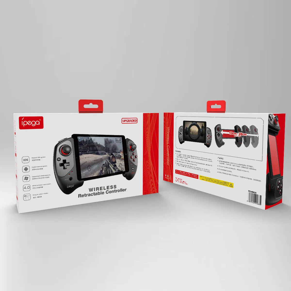Red telescopic gamepad controller with USB cable on a dark surface.