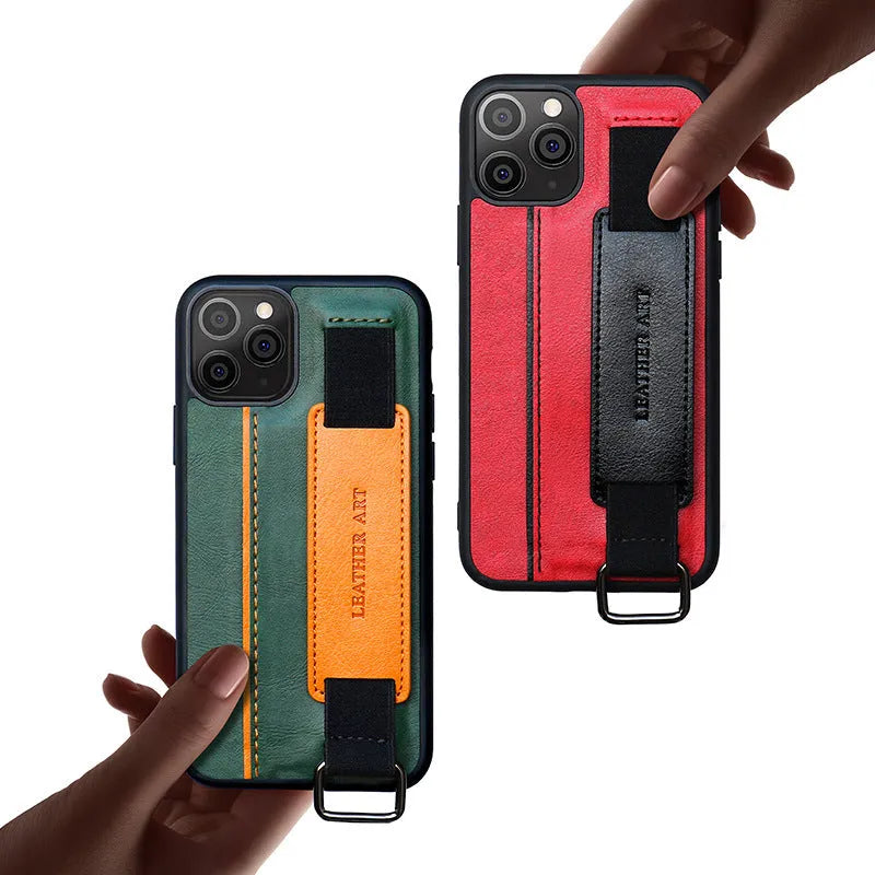 Brown imitation leather iPhone case with a wrist strap, shown attached to an iPhone.