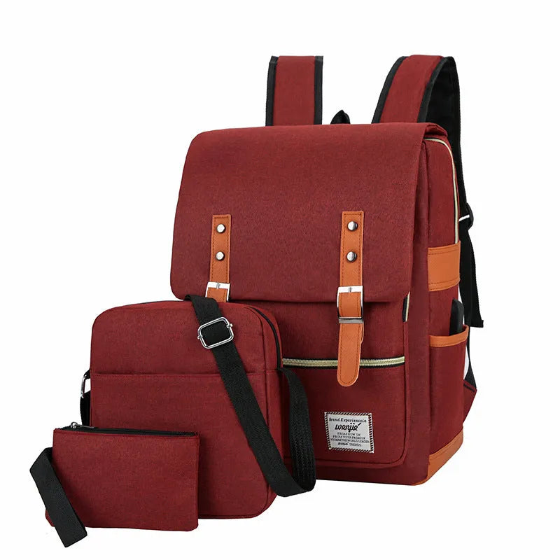 Three-piece business backpack in Oxford cloth, shown in wine red, with curved shoulder straps.