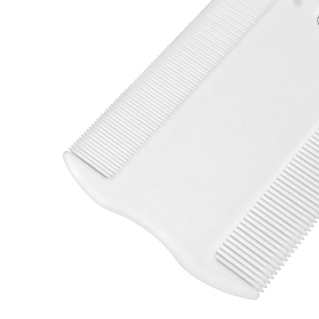 Small white plastic double-sided flea comb for dogs and cats on a plain background.