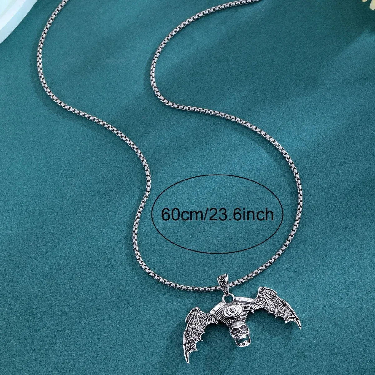 Gothic dark skull necklace with aluminium alloy skeleton wing pendant on dark background