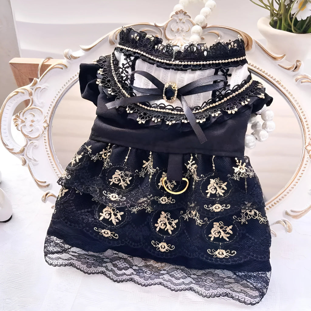 Golden gothic princess skirt costume on a small dog, showing the pet clothing design.
