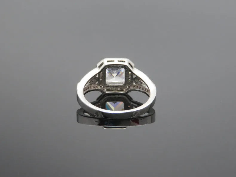 Geometric women's zircon ring with hollow quadrilateral design in platinum colour on copper