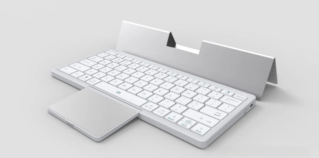 Black and grey wireless Bluetooth keyboard with touch pad next to its leather sheath stand for a tablet.