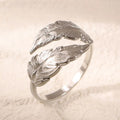 Women's adjustable feather ring in titanium steel with silver or gold electroplated finish