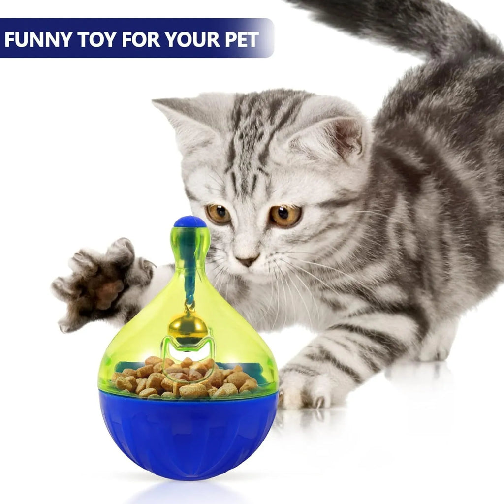 Tumbler-shaped pet treat dispenser toy for dogs and cats with leaky food openings