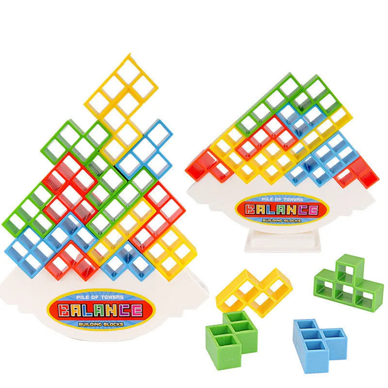Plastic balance stacking board game with 16 colourful blocks, chassis, and base on a table.