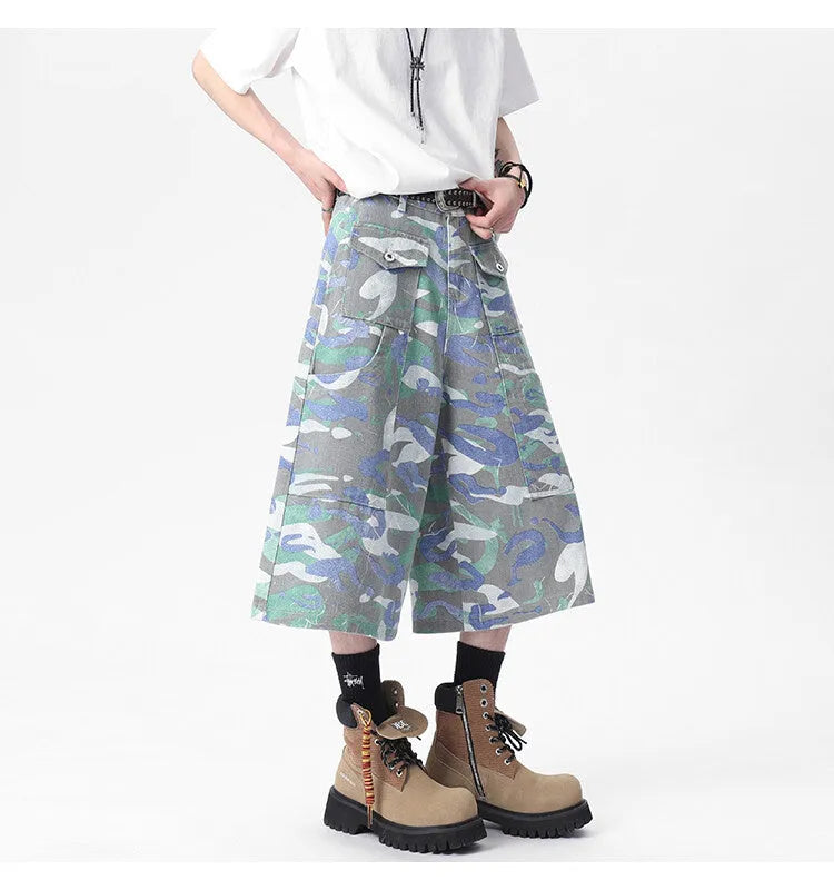 Denim camouflage cropped trousers with straight leg and utility pockets on mannequin