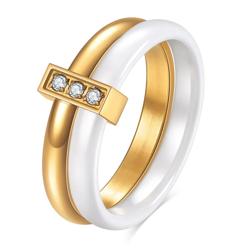 Geometric ceramic women's ring with a round 6mm zirconia stone in steel black colour.