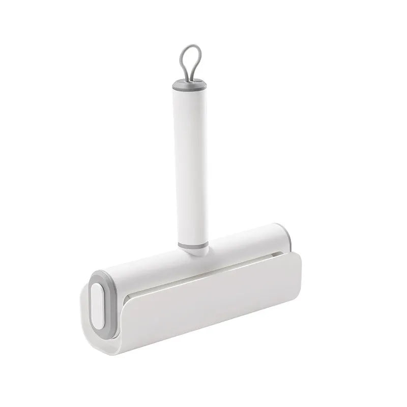Refillable lint remover roller for picking up cat hair from floors and carpets