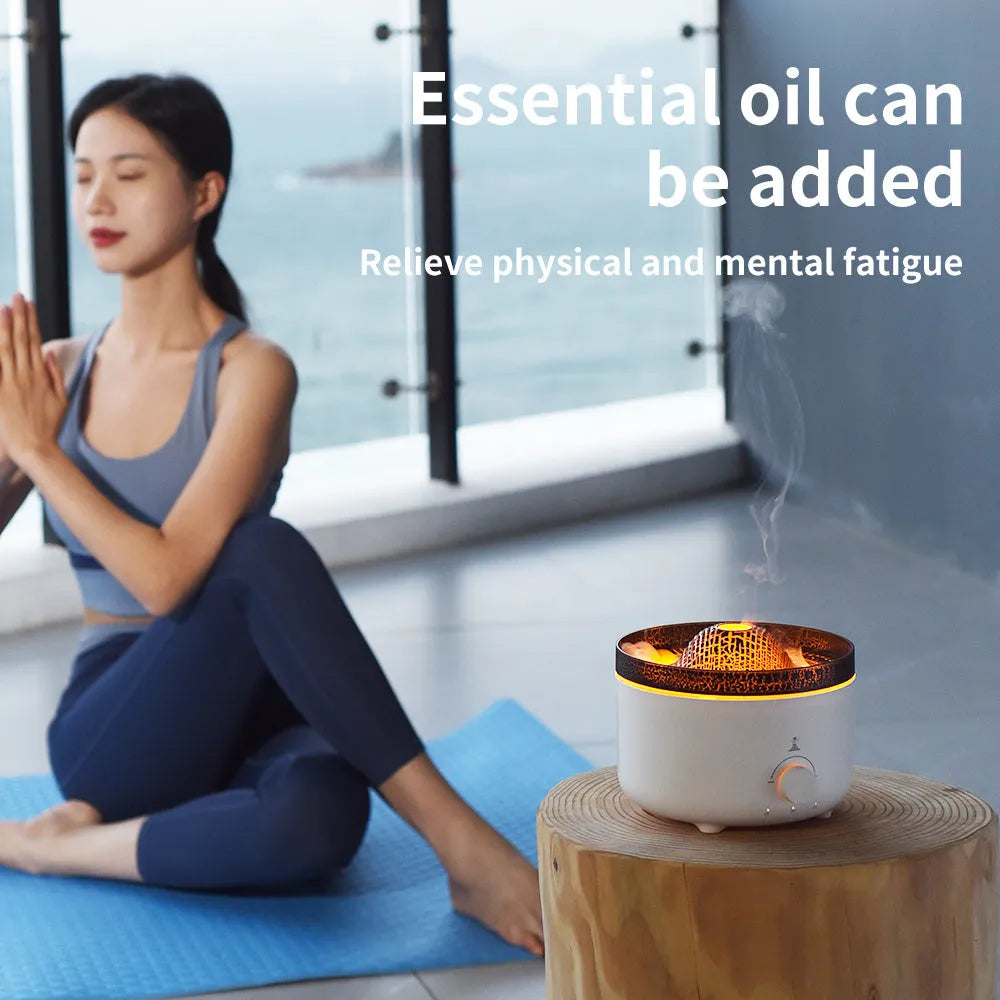 Small white volcano-shaped humidifier with simulated flame lighting and remote control on wooden table