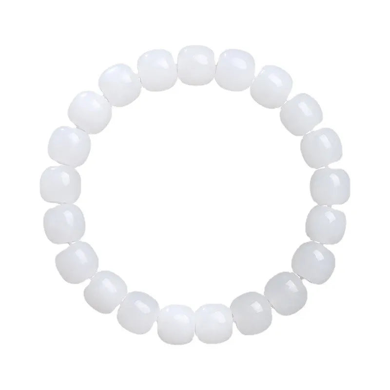White jade barrel bead bracelet showing Hetian jade construction with traditional barrel beads