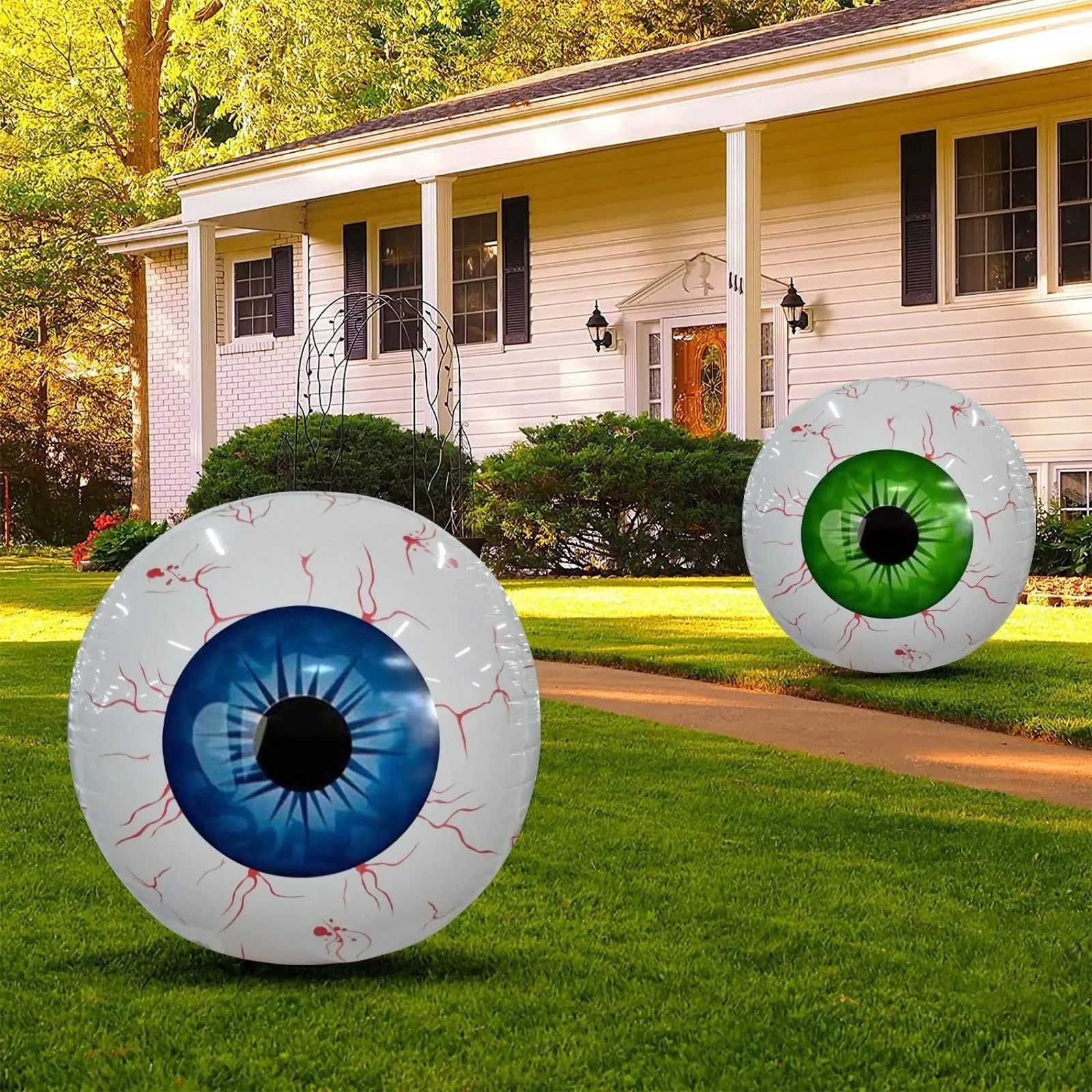 Green Halloween eyeball balloon inflatable with red bloodshot veins pattern