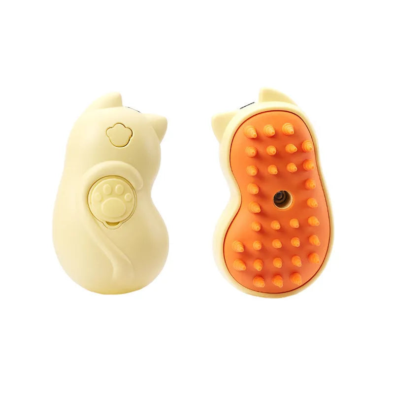 White 3-in-1 steam grooming brush for cats and dogs on a grey surface.