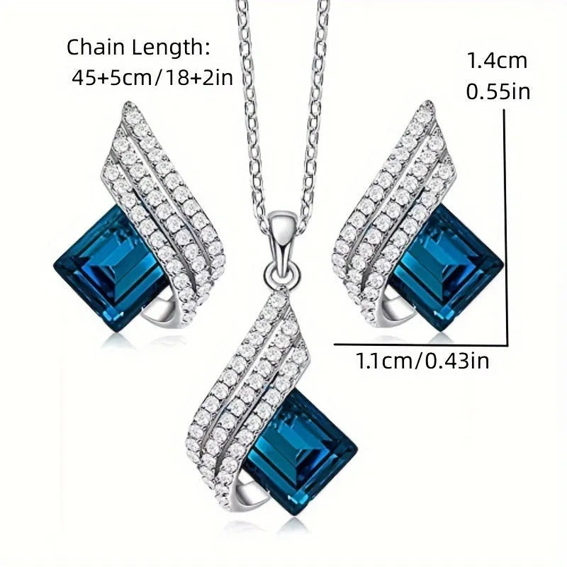 Women's electroplated necklace and earring set with alloy pendant and glass accents on cross chain